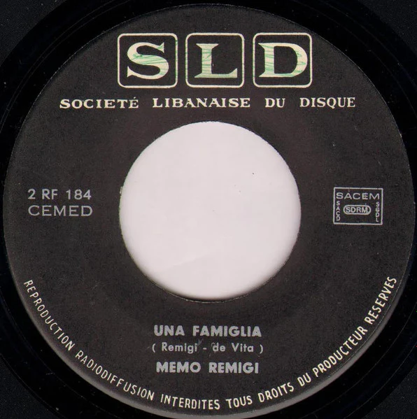 Memo Remigi - Un Ragazzo... Una ragazza (7") - Image 2